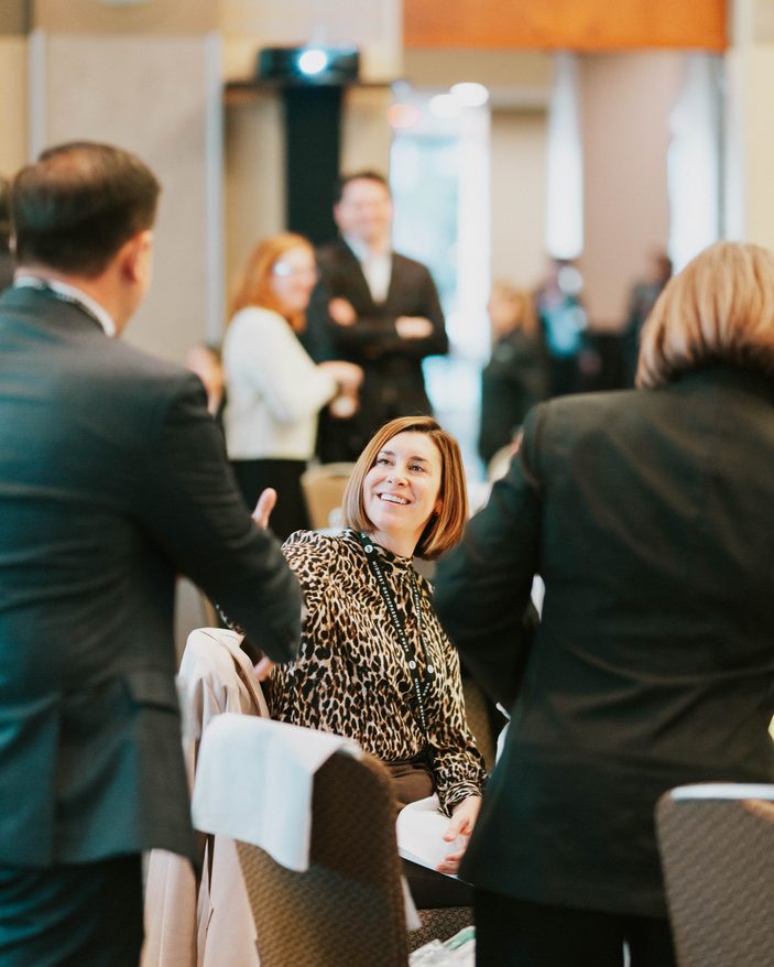Guests connecting before the program